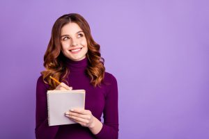 Woman Writing and Thinking